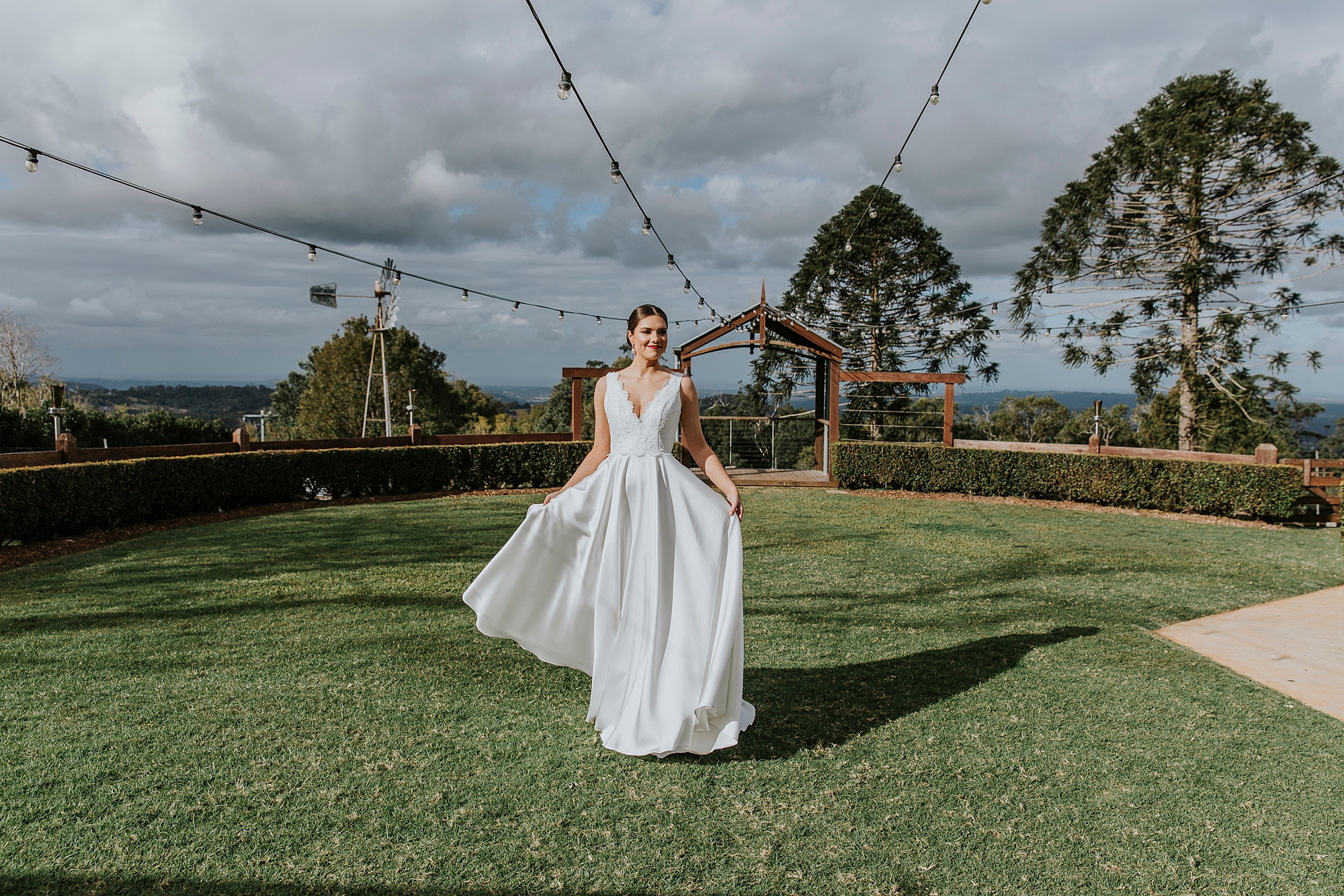 model walking through Flaxton Gardens in Paddington Weddings dress