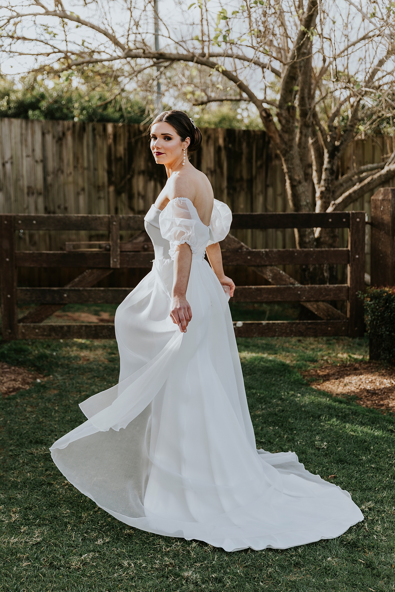 Bride modelling Paddington Weddings dress at Flaxton Gardens